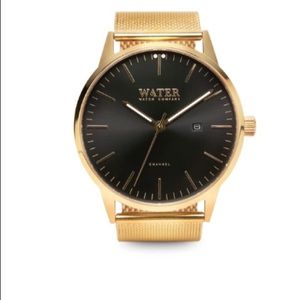 Brand new gold tone watch